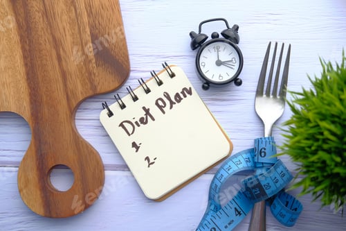 Preview: Notepad on chopping board with wooden fork and spoon