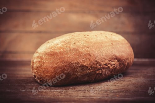 Preview: Delicious bread on a wood table