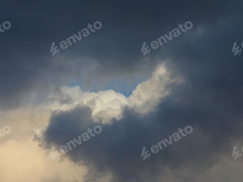 Preview: Stormy Clouds And Blue Sky - Photograph Of Stormy And Dramatic Clouds On The Top And Bottom Of The