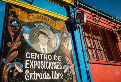 Preview: Colorful street mural welcoming visitors to Caminito's exhibition center