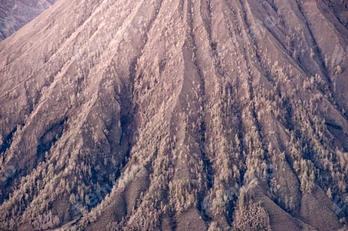 Preview: Close up Photo of the Slopes of the Cone Shaped Mount Batok Volcano covered in ask from a volcanic e