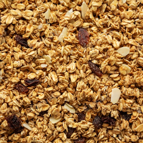Preview: Homemade Granola with raisins and almonds background, top view. Flat lay, overhead, from above.