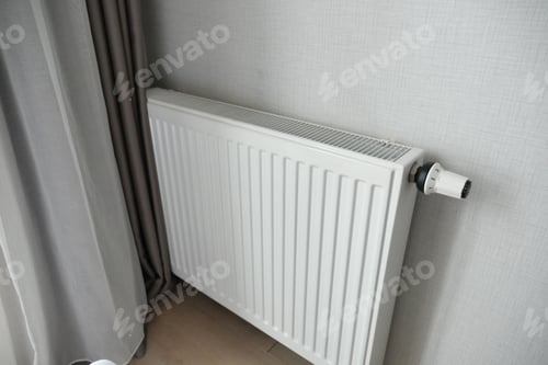 Preview: heating radiator under window in the room