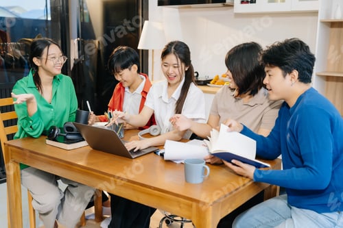 Preview: Group of students with books preparing for exams during holidays.