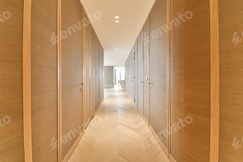 Preview: a long hallway with wooden cabinets and a white floor