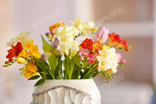 Preview: Beautiful bouquet of freesia flowers on blurred background