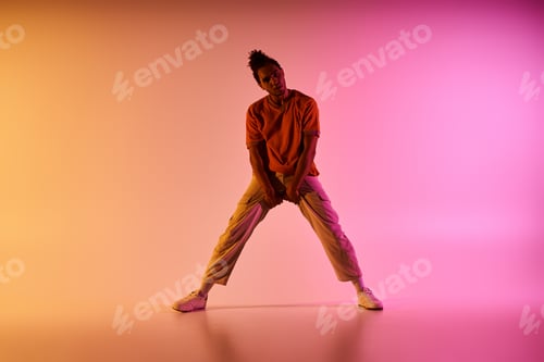 Preview: A young dancer moves with grace on a vibrant background