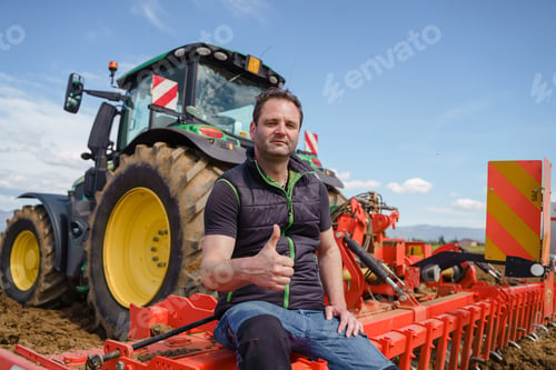 Preview: A happy farmer shows off his successful crop rotation and soil preparation techniques, with a thumbs