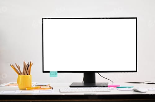 Preview: Mockup computer big blank screen on a professional designer desk in a comfortable office.