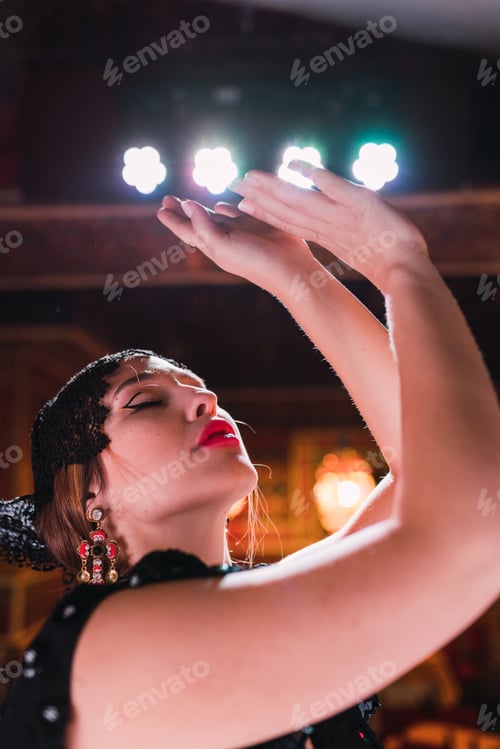 Preview: Woman in dress dancing flamenco on scene