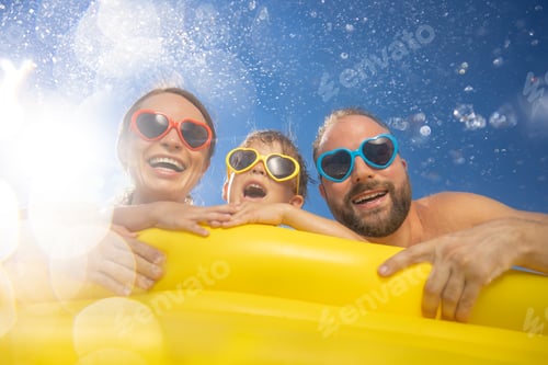 Preview: Happy family having fun on summer vacation