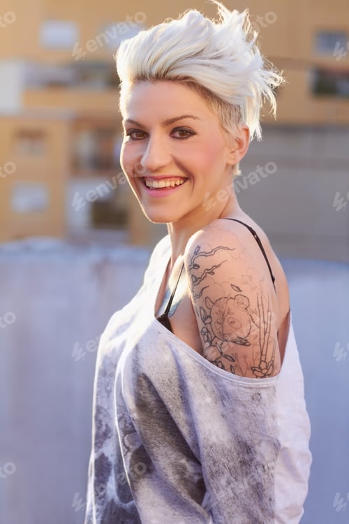 Preview: Capture my style. Shot of a young woman with tattoos.