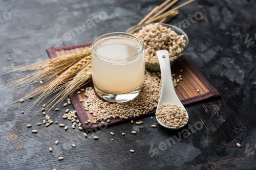 Refreshing Barley Water Drink with Grain and Spoon