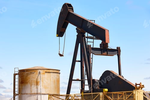 Preview: Rusty oil pumping machine. Pump jack in Ayoluengo, Burgos. Spain