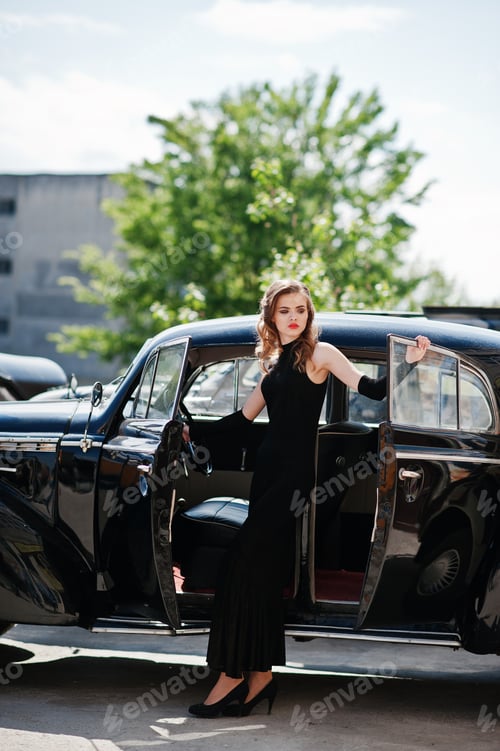 Preview: Portrait of beautiful sexy fashion girl model with bright makeup in retro style near vintage car