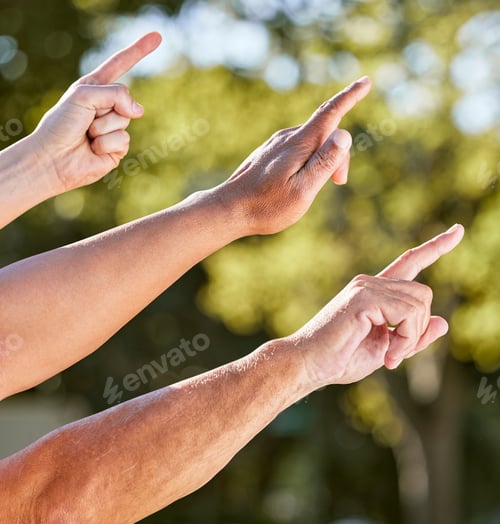 Preview: What is that over there. Shot of a group of unrecognisable men pointing upwards outdoors.