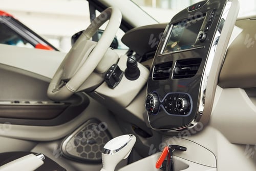 Preview: Inside of brand new modern electrical car. Particle view. Cropped photo