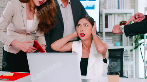 Preview: Businesswoman is feeling stressed when coworkers rush to finish work.