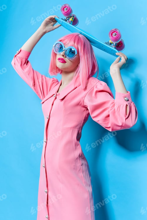Preview: glamorous woman in sunglasses wears a pink wig studio model unaltered