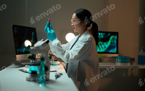 Preview: Scientist Examining Blood Sample in Laboratory Setting