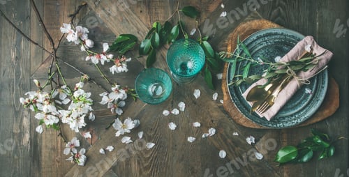 Preview: Flat-lay of Spring Easter Table setting with almond blossom flowers