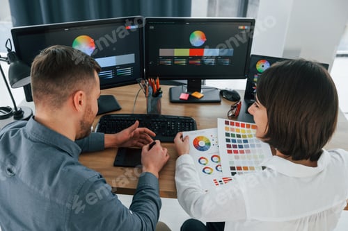 Preview: Positive communication. Two designers working together in the office