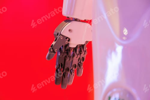 Preview: Part of the robot on a red background - robot puts his hand forward