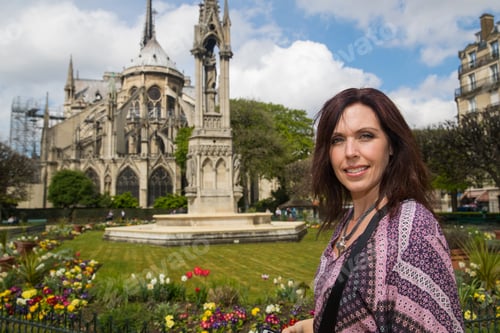 Preview: Woman visits Notre-Dame in Paris, France