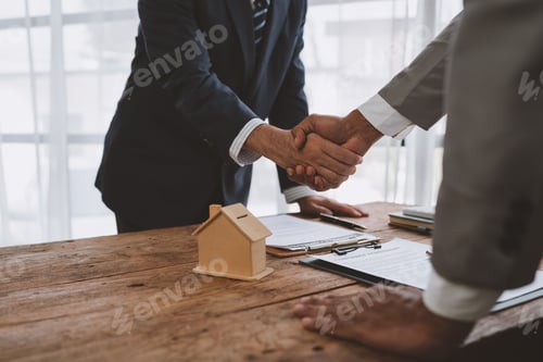 Preview: Handshake of real estate brokers with customers or investors, mortgage loan agreements Make a lease-