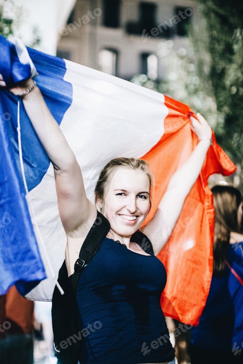 Preview: Woman holding the french flag