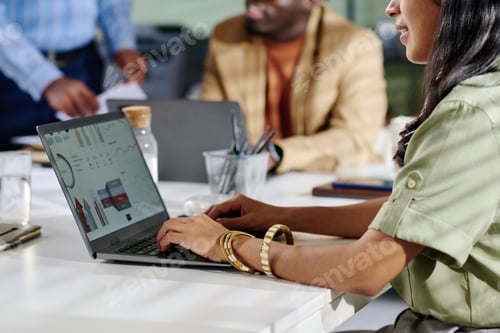 Preview: Collaborating While Analyzing Business Data on Laptop