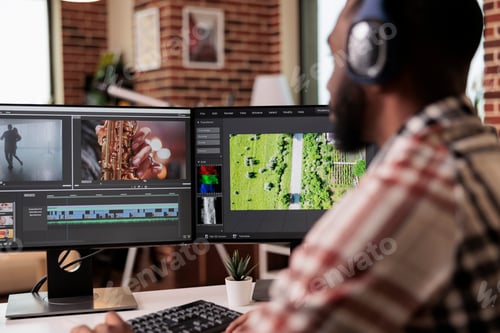 Preview: Graphic designer editing footage on software