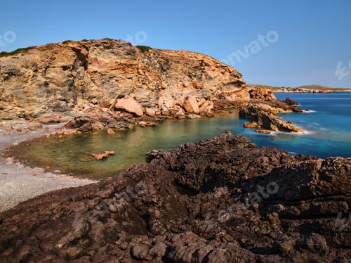Preview: Rocks and sea in long exposure in Menorca
