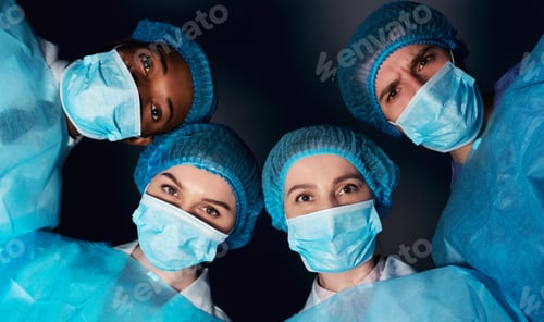 Preview: Medical Professionals in Surgical Masks Looking Down