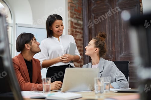 Preview: Multi-Ethnic Business Team in Office