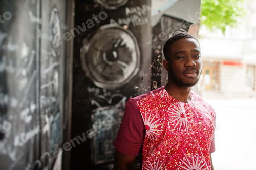 Preview: Black young man wearing african traditional clothes