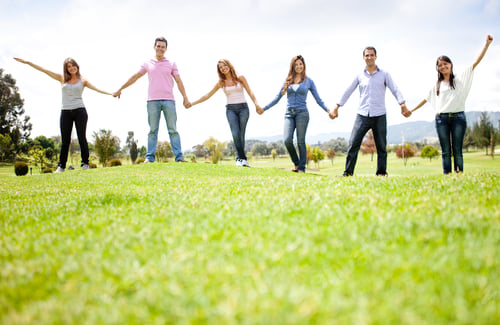 Preview: Group Of Friends Holding Hands Outdoors Having Fun