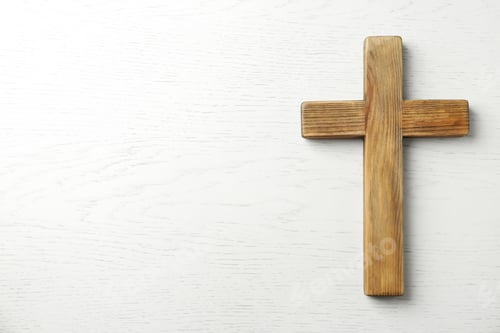 Preview: Christian cross on white wooden background, top view with space for text. Religion concept