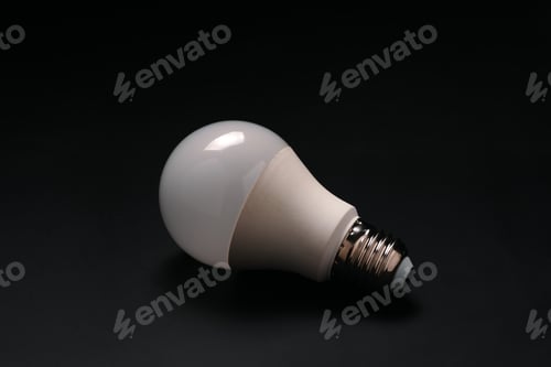 Preview: The electric bulb on the black floor