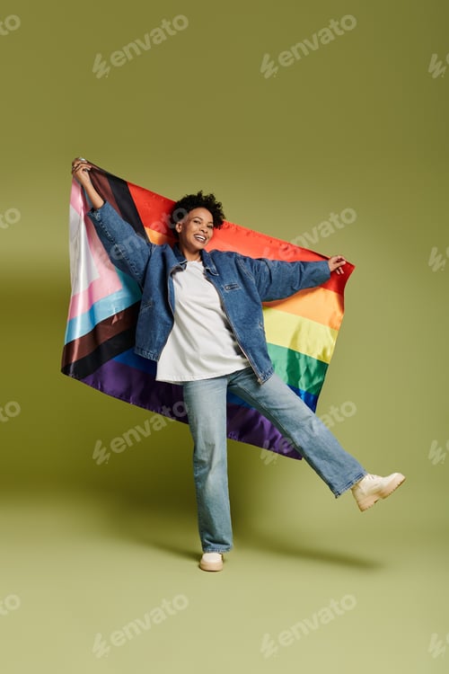 Preview: Celebrating love and fashion with a stylish lesbian couple wrapped in vibrant pride colors