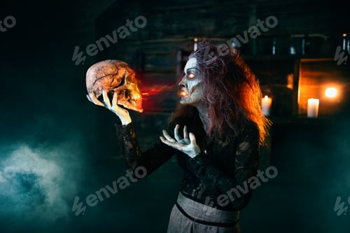 Preview: Scary witch holds human skull and reads the spell