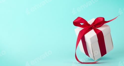 Preview: Gift box with red ribbon