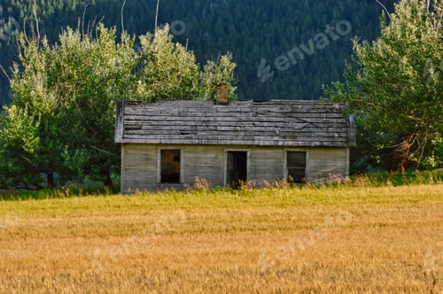 Preview: Beautiful rural view of a small wooden cabin
