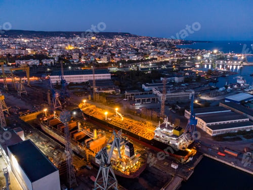 Preview: aerial view shipyard dry dock maintenance and repair cargo ship transport and oil ships in sea