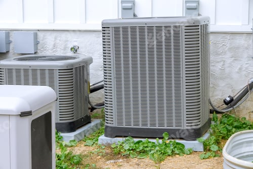 Preview: An outdoor a air conditioning system is installed on facade of new house