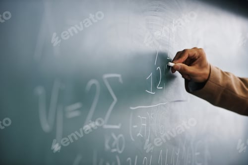 Preview: Its all in the formula...Cropped image of a teacher writing a formula on a blackboard.