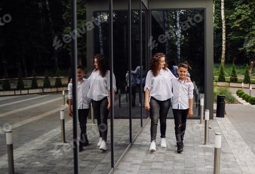 Preview: cheerful smiling boy walks with his mother