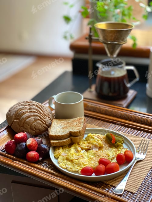 Preview: Breakfast Still Life Featuring Eggs Toast and Pastry