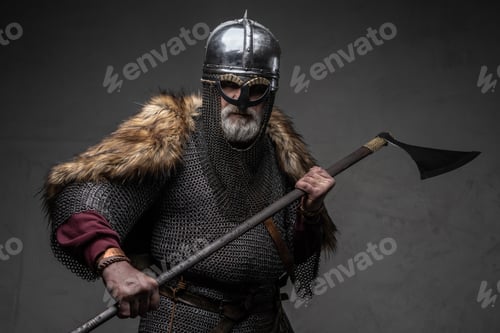 Preview: Violent viking fighter dressed in authentic armored clothing