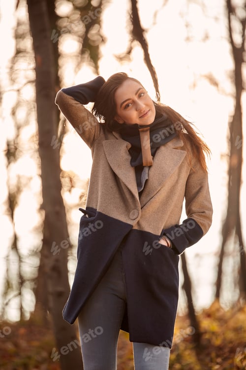 Preview: One Young Girl Caucaisan Candid Portrait, Looking At Camera. Backlit Sunny Sunset, Forest Autumn
